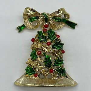 Vintage Gerry’s articulated bell and holly gold tone costume Christmas brooch